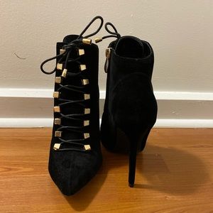 Stiletto black suede booties